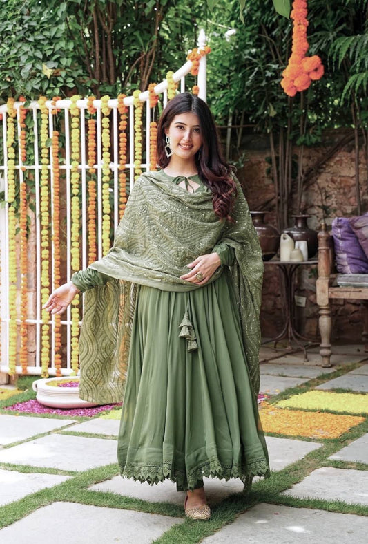 Raveena Ceremony Wear Mehndi Color Gown With Work Dupatta